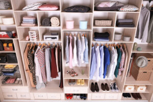 Large wardrobe with different clothes, home stuff and shoes