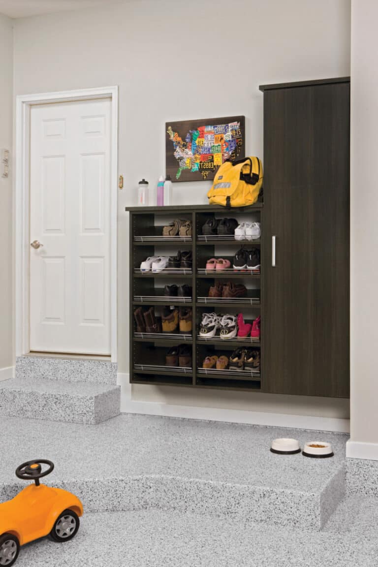 Garage with cabinets and shelves